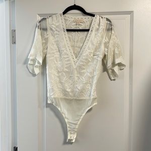 White lace body suit